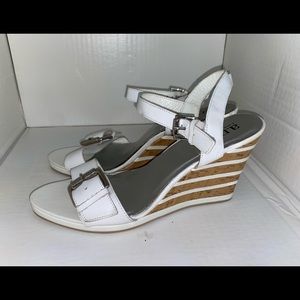 White wedges with striped pattern on wedge.